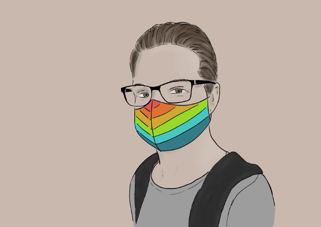 Bild einer Person mit Haaren im Perdeschwanz, einer Brille und Regenbogenmaske